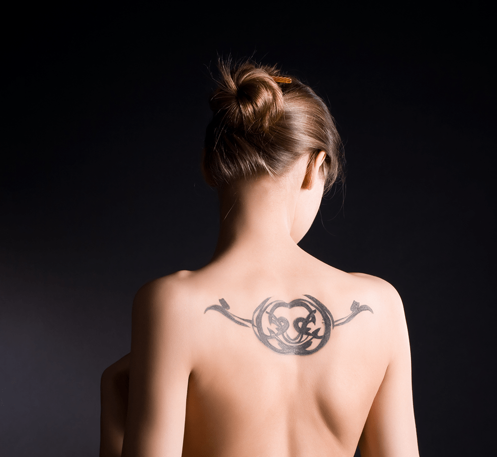woman with tattoo on her back